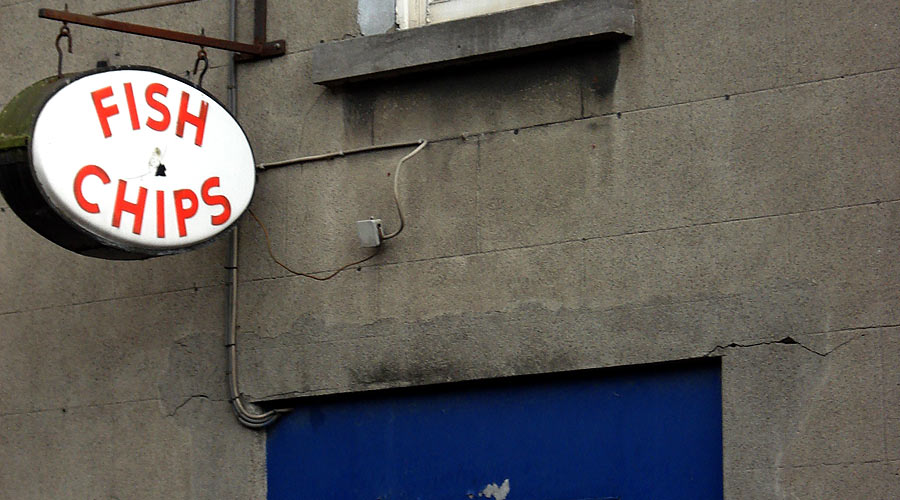 A rundown fish and chip shop. The only kind of fish and chip shop.